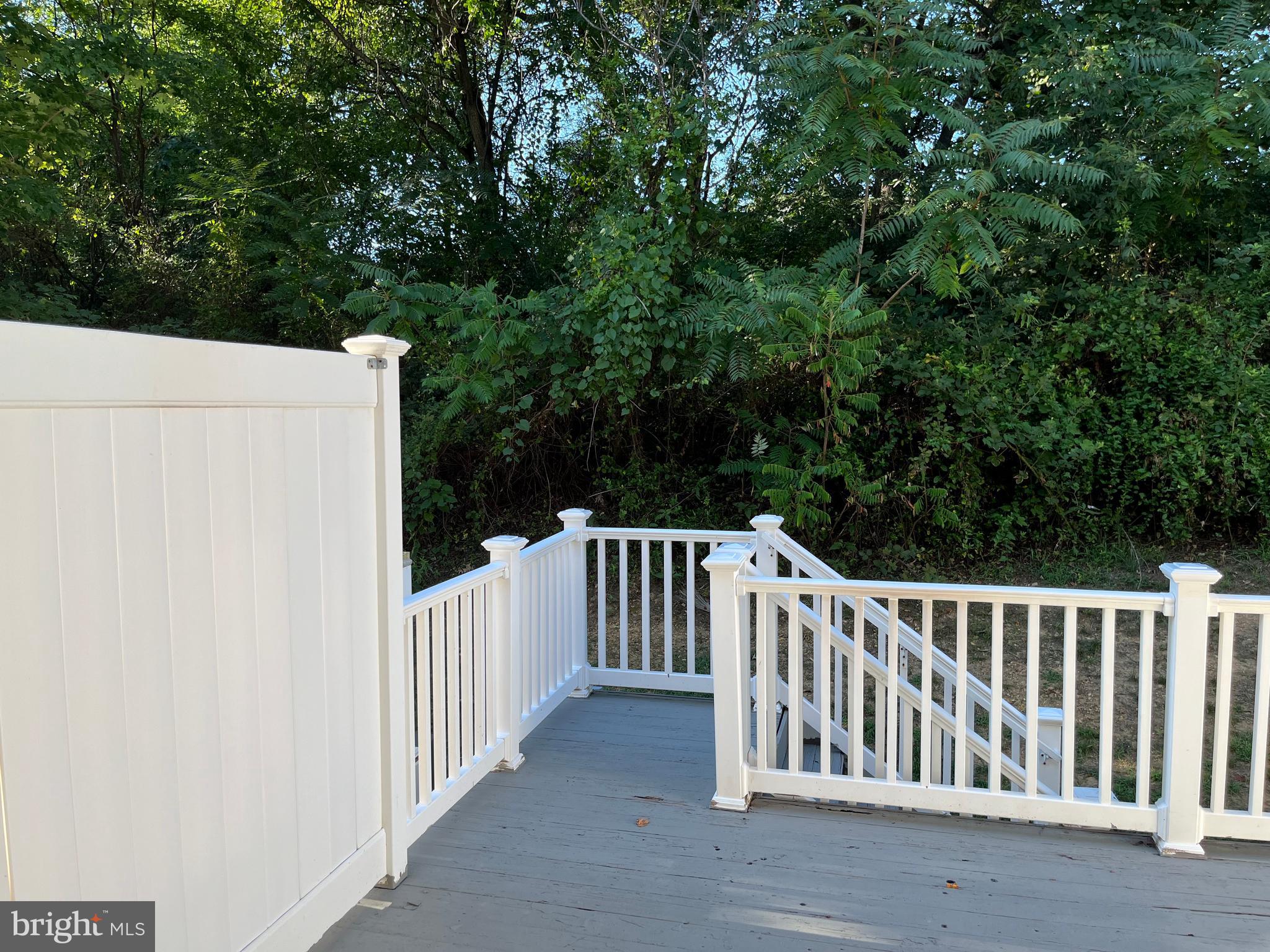 3316 Castle Ridge Circle, Unit 16 Silver Spring, MD 20904 - Photo 19 of 71 a view of deck and backyard