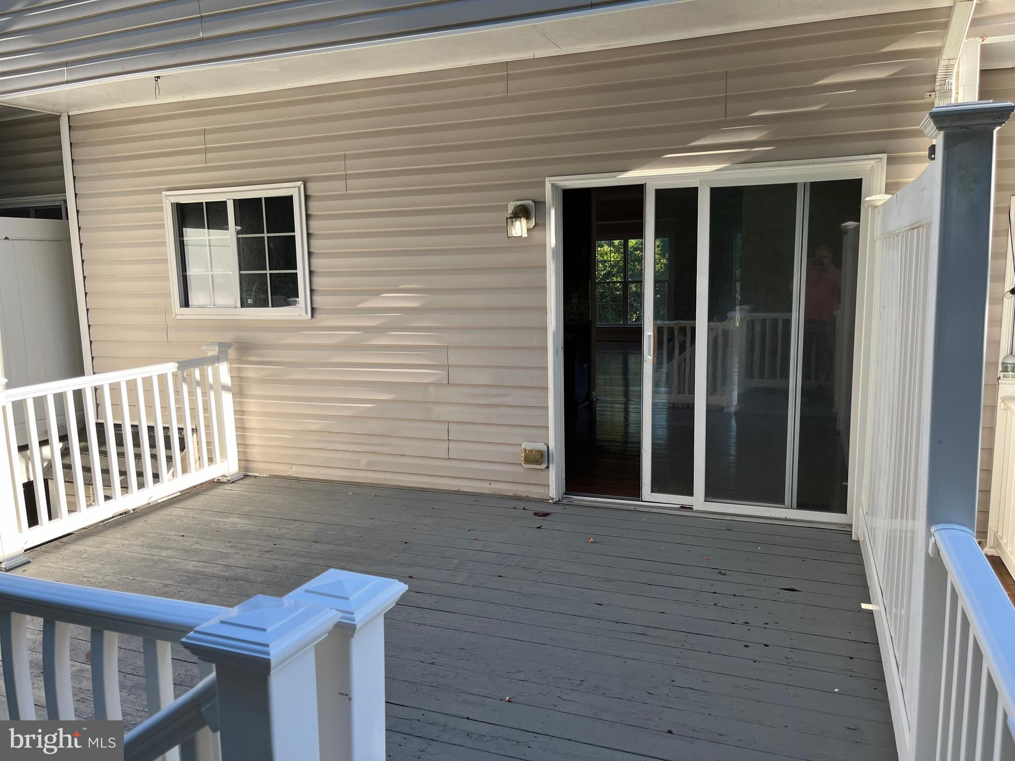 3316 Castle Ridge Circle, Unit 16 Silver Spring, MD 20904 - Photo 21 of 71 a view of a house with wooden deck