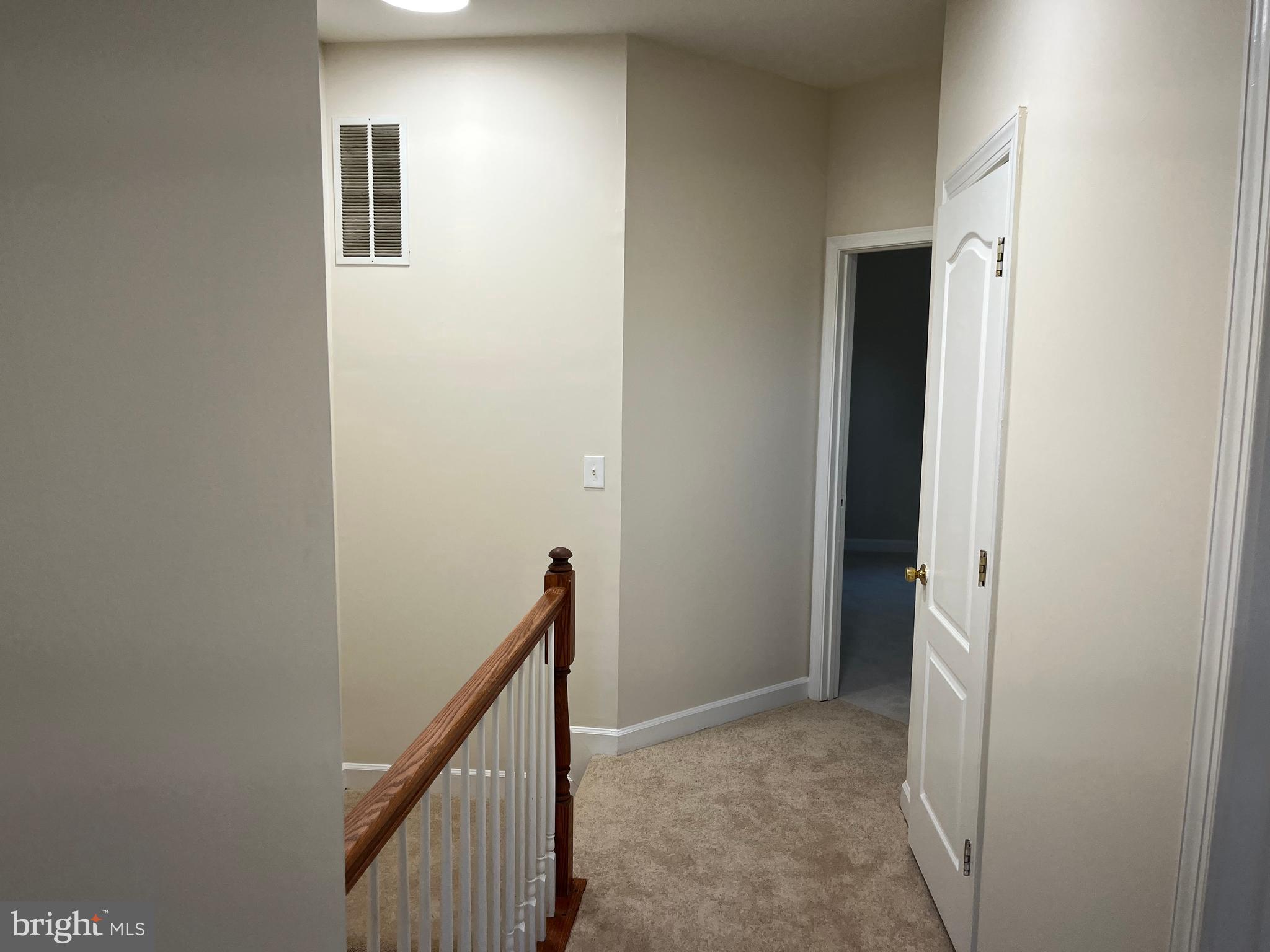 3316 Castle Ridge Circle, Unit 16 Silver Spring, MD 20904 - Photo 42 of 71 a view of a hallway to rooms