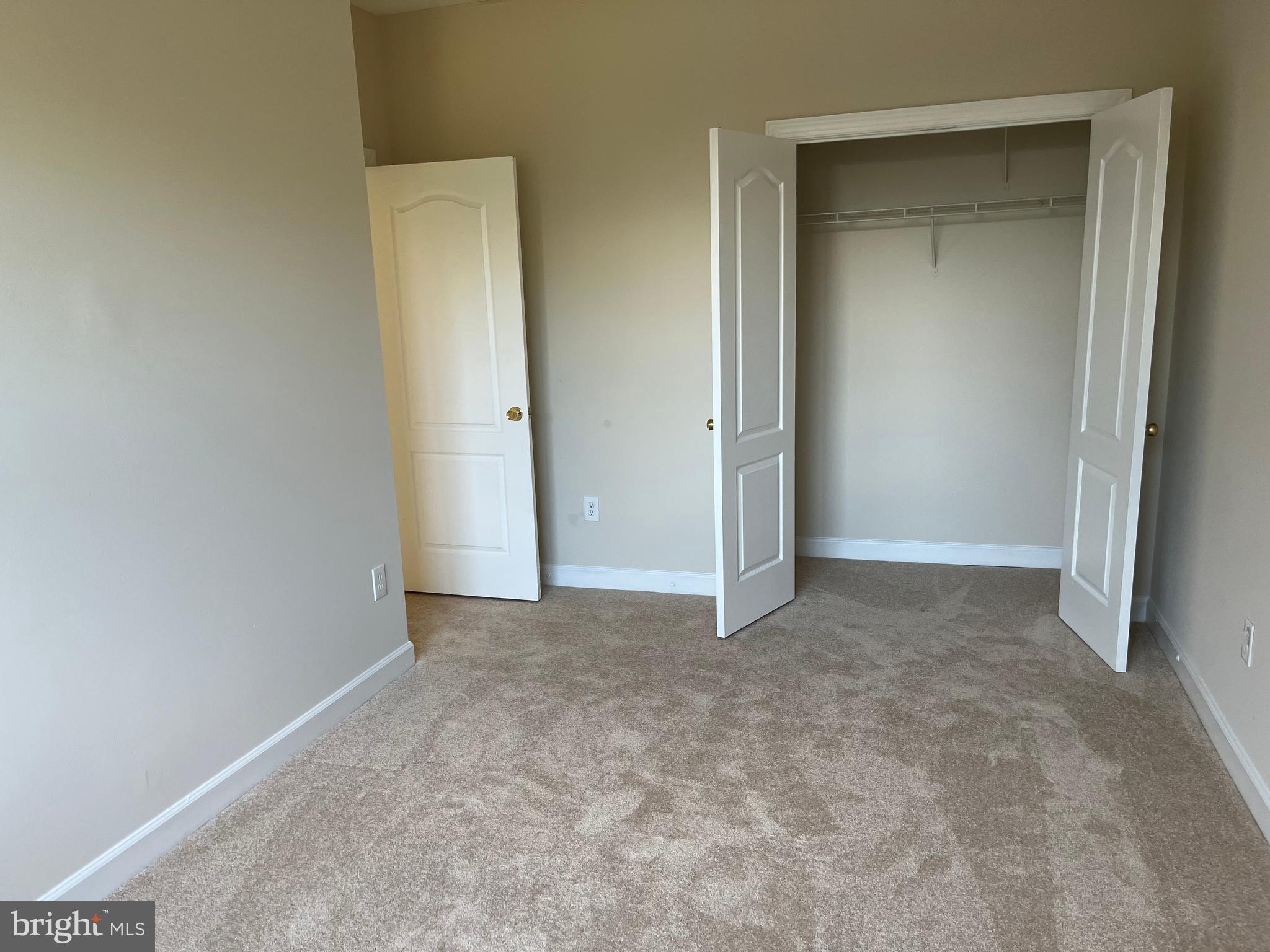 3316 Castle Ridge Circle, Unit 16 Silver Spring, MD 20904 - Photo 57 of 71 a view of an empty room and closet area