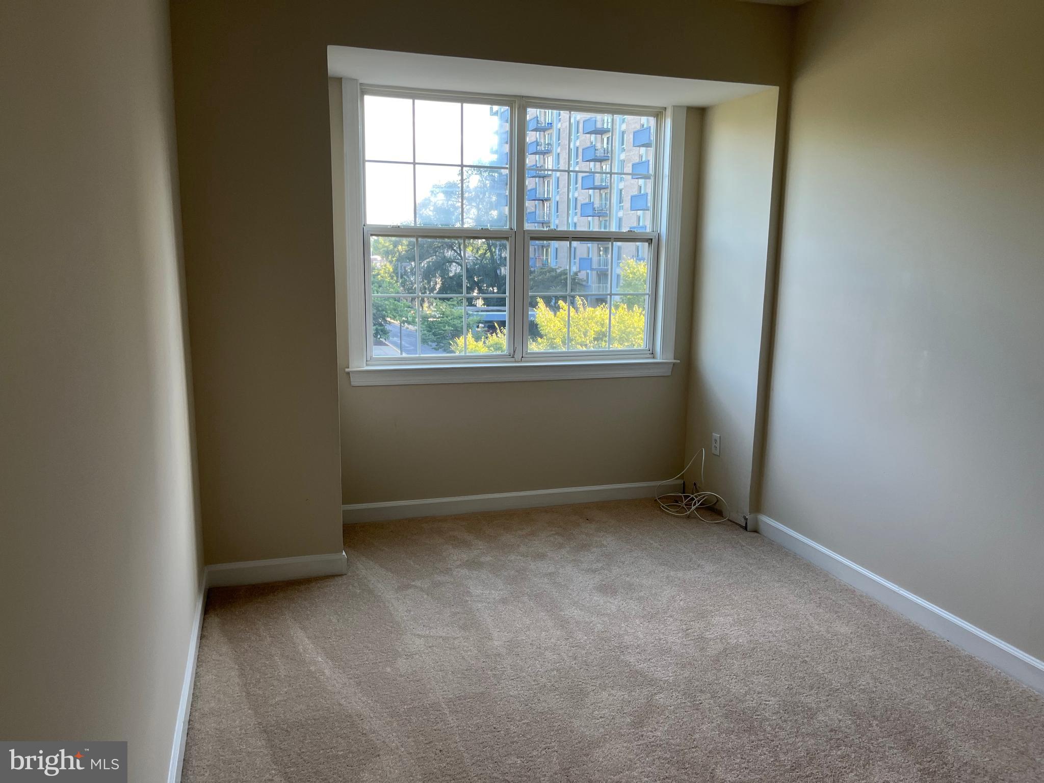 3316 Castle Ridge Circle, Unit 16 Silver Spring, MD 20904 - Photo 59 of 71 an empty room with a window