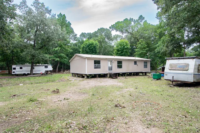 a house view with a garden space