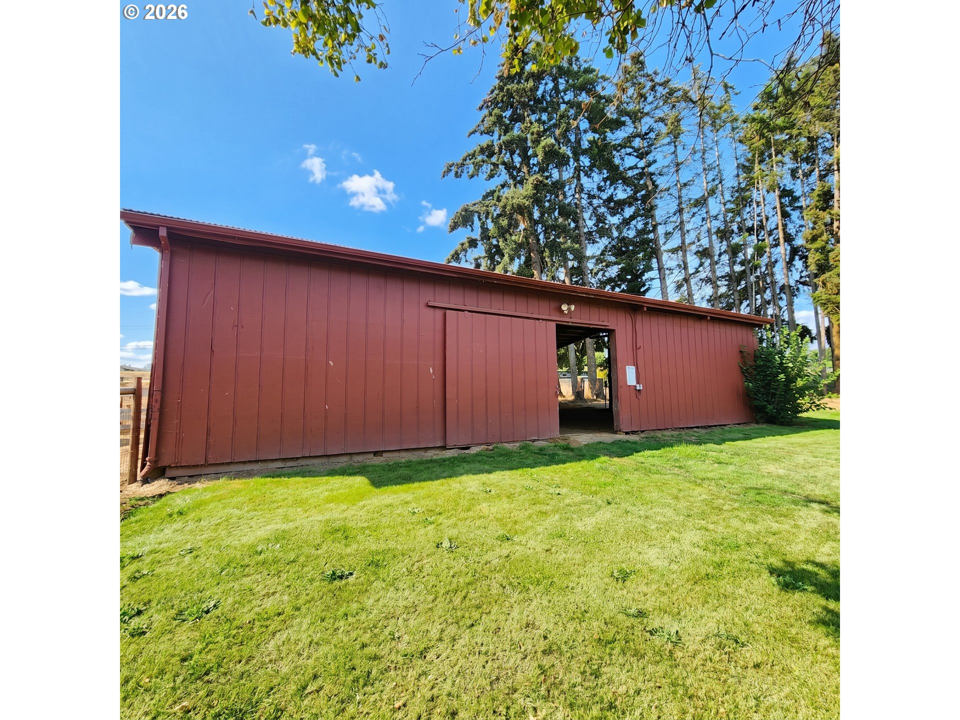 54047 West Lane Road Scappoose, OR 97056 - Photo 22 of 44 a view of an house with backyard space and garden