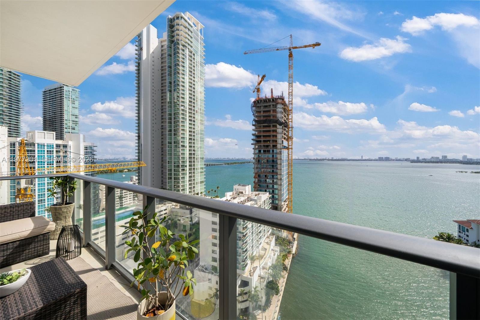 460 Northeast 28th Street, Unit 1901 Miami, FL 33137 - Photo 2 of 31 a view of a balcony with an ocean view