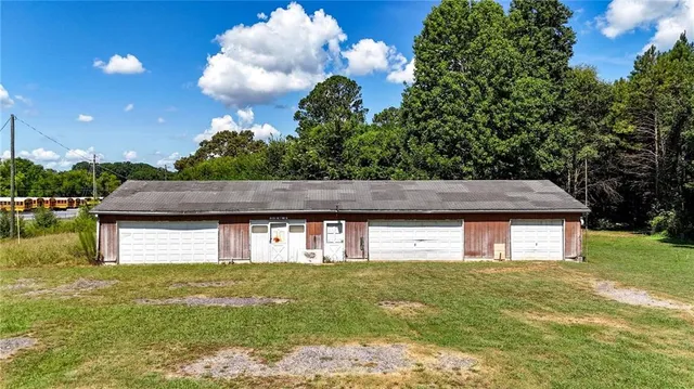 a house view with a garden space