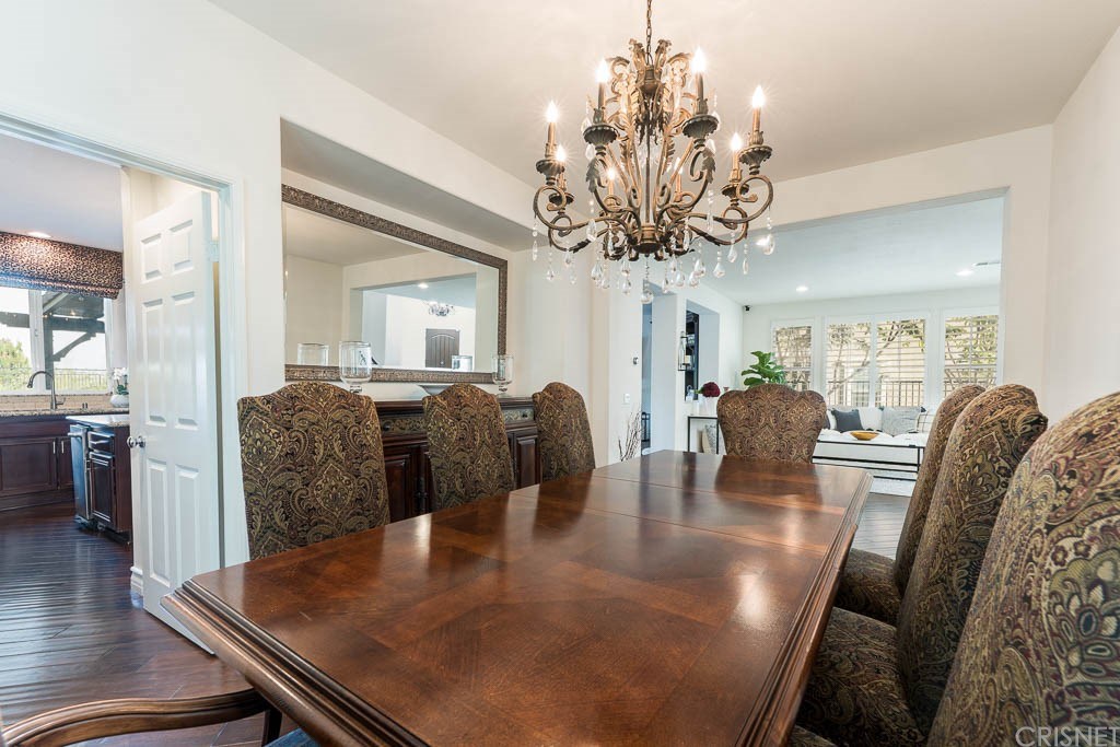 11564 Apulia Court Porter Ranch, CA 91326 - Photo 14 of 72 a view of a dining room with furniture and wooden floor