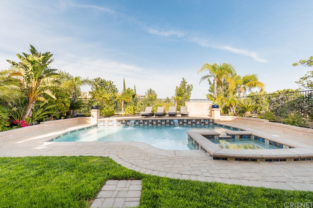 11564 Apulia Court Porter Ranch, CA 91326 - Photo 3 of 72 a view of a swimming pool with outdoor space and seating area