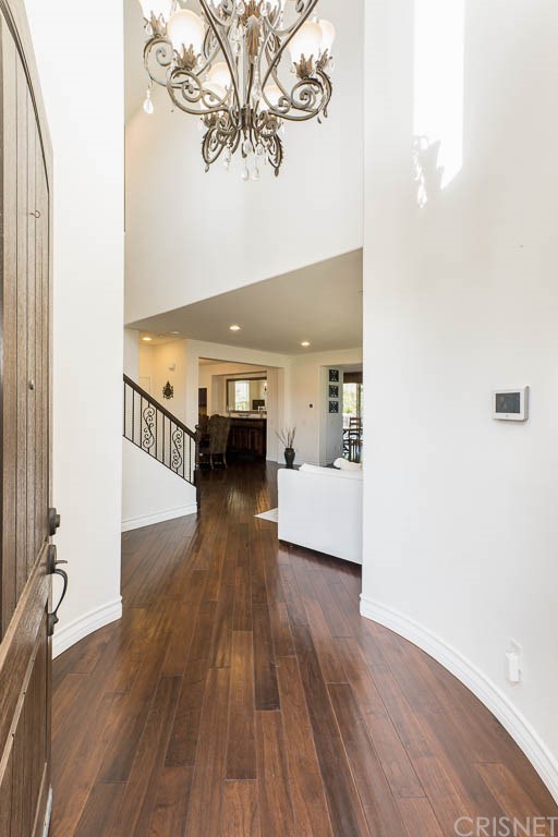 11564 Apulia Court Porter Ranch, CA 91326 - Photo 4 of 72 a living room with furniture and a wooden floor