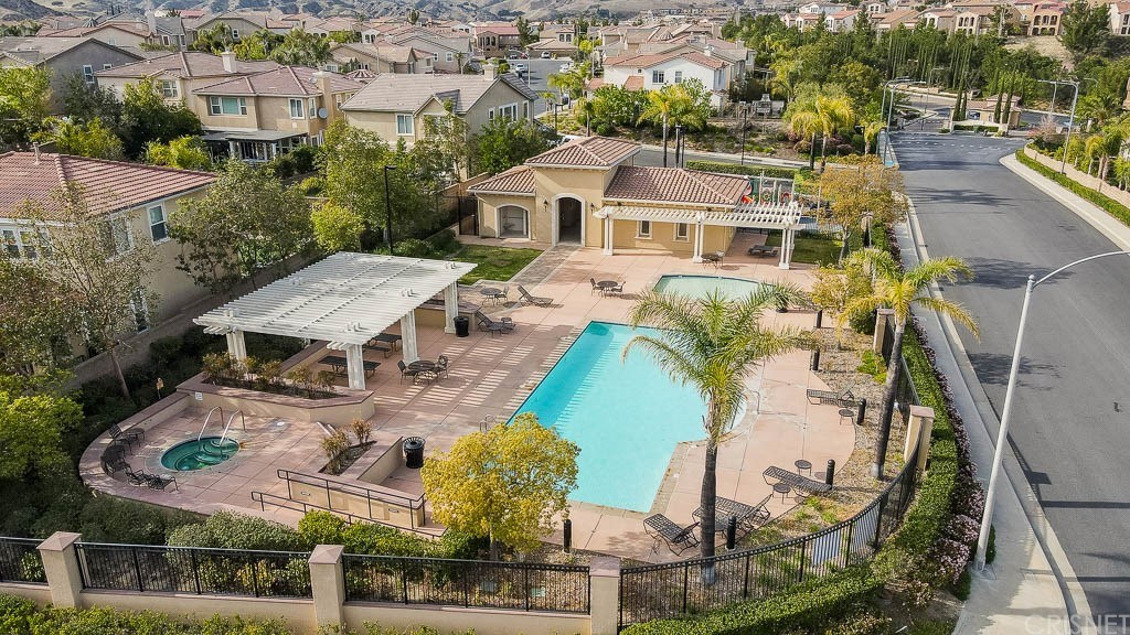 11564 Apulia Court Porter Ranch, CA 91326 - Photo 51 of 72 an aerial view of a house with a swimming pool