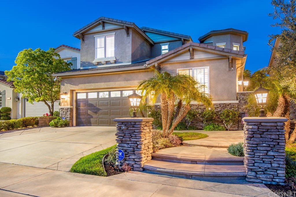 11564 Apulia Court Porter Ranch, CA 91326 - Photo 68 of 72 a front view of a house with a yard