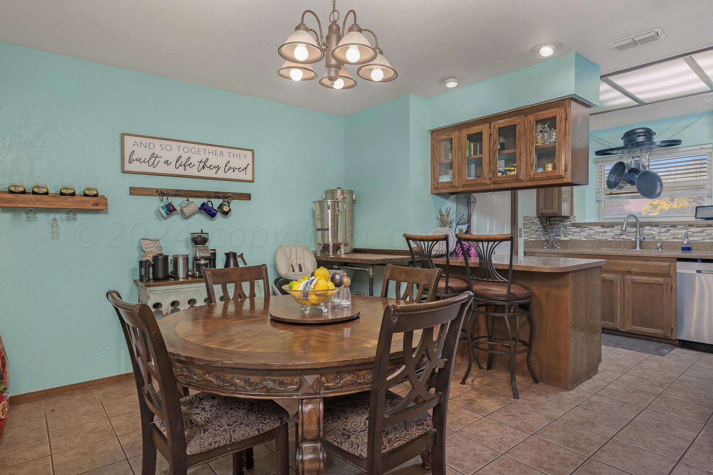 7232 Bayswater Road Amarillo, TX 79109 - Photo 8 of 23 008_Breakfast Room and Kitchen