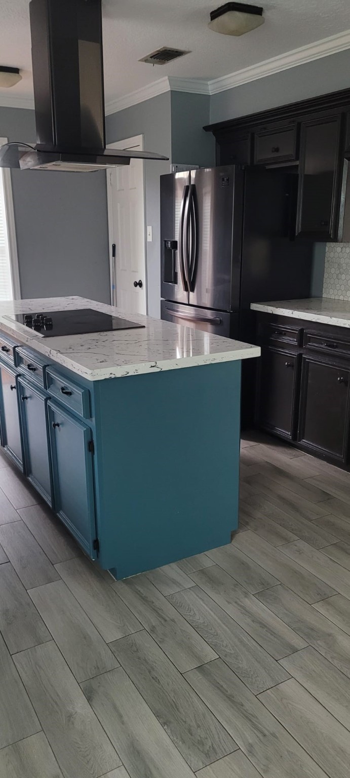 12007 Carriage Ridge Court Houston, TX 77070 - Photo 6 of 14 a kitchen with stainless steel appliances granite countertop a sink and a stove