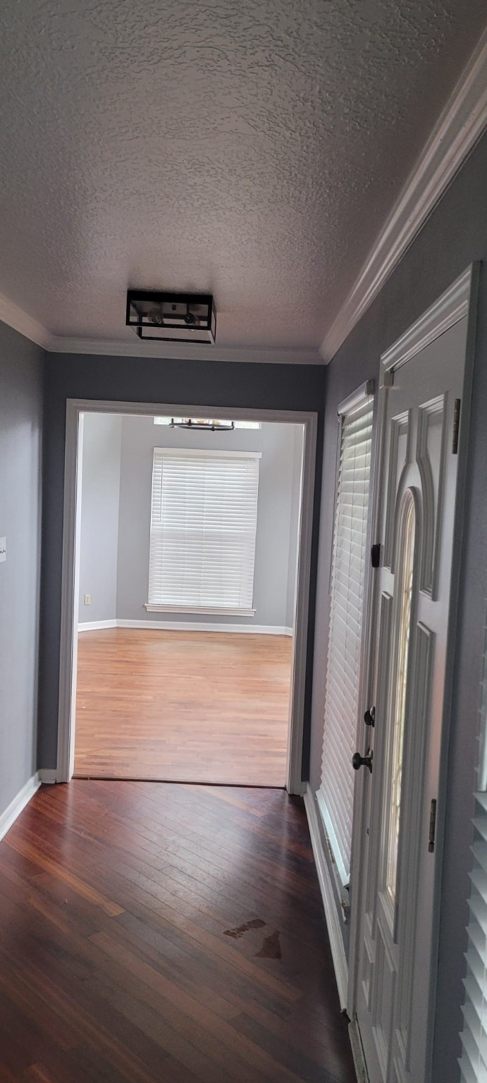 12007 Carriage Ridge Court Houston, TX 77070 - Photo 9 of 14 a view of walk in closet with wooden floor