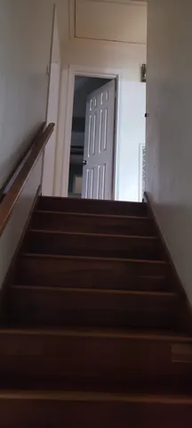 a kitchen with a sink a window and appliances