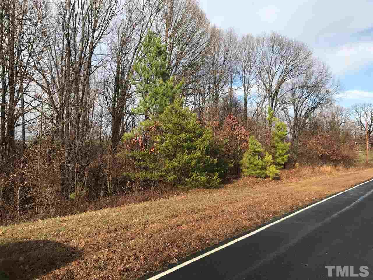 Lot 2 Fontaine Roxboro, NC 27574 - Photo 4 of 7 a view of a yard and a wooden fence