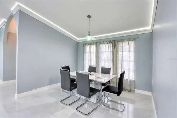 a kitchen with sink and stainless steel appliances