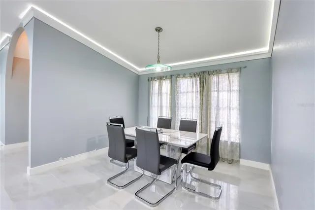 a kitchen with sink and stainless steel appliances
