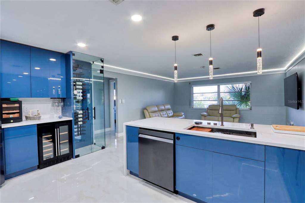 2500 Rio Lisbo Court Punta Gorda, FL 33950 - Photo 26 of 71 a kitchen with a sink stove and cabinets