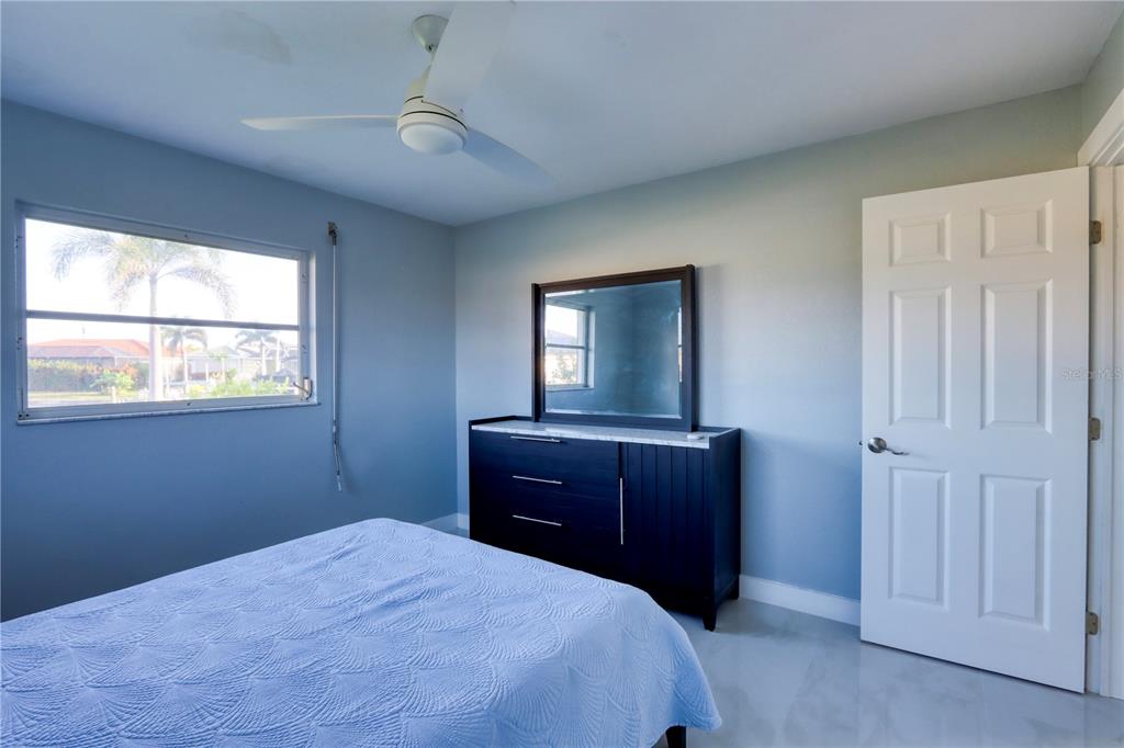 2500 Rio Lisbo Court Punta Gorda, FL 33950 - Photo 28 of 71 a bedroom with a bed and a window