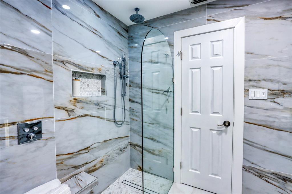 2500 Rio Lisbo Court Punta Gorda, FL 33950 - Photo 32 of 71 a bathroom with a tub and shower