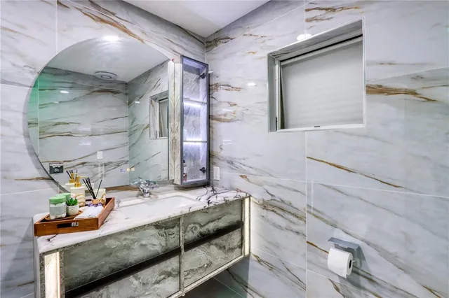 a close view of a utility room with dryer and washer