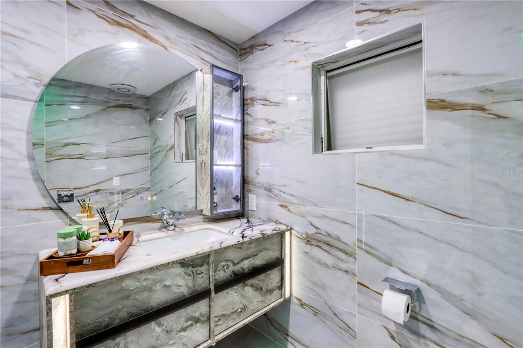 2500 Rio Lisbo Court Punta Gorda, FL 33950 - Photo 33 of 71 a bathroom with a sink and a mirror