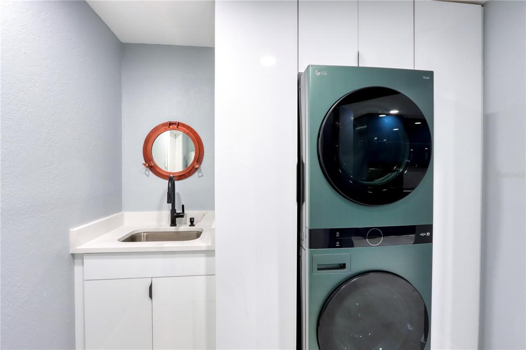 2500 Rio Lisbo Court Punta Gorda, FL 33950 - Photo 42 of 71 a close view of a utility room with dryer and washer
