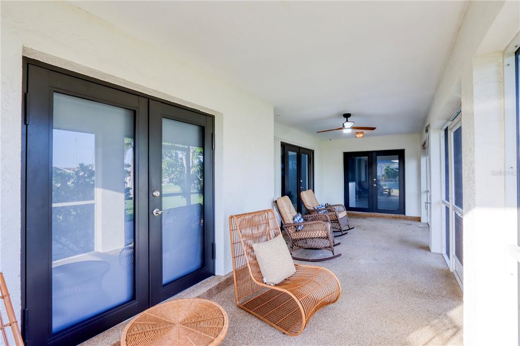 2500 Rio Lisbo Court Punta Gorda, FL 33950 - Photo 44 of 71 a living room with furniture and large window