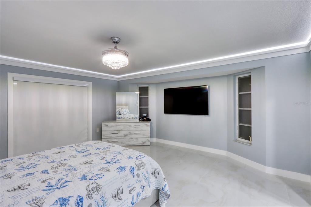 2500 Rio Lisbo Court Punta Gorda, FL 33950 - Photo 48 of 71 a bedroom with a bed and a flat screen tv