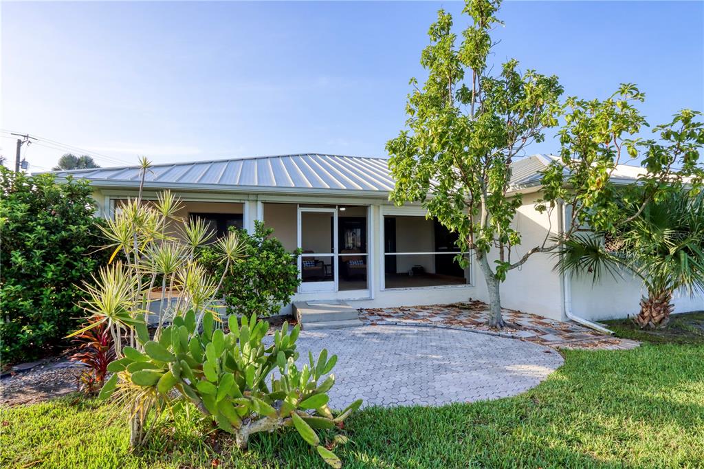 2500 Rio Lisbo Court Punta Gorda, FL 33950 - Photo 65 of 71 a front view of a house with a garden