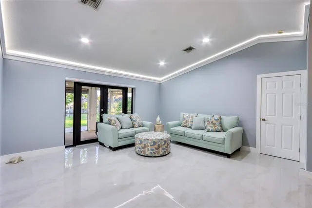 a living room with furniture and a table