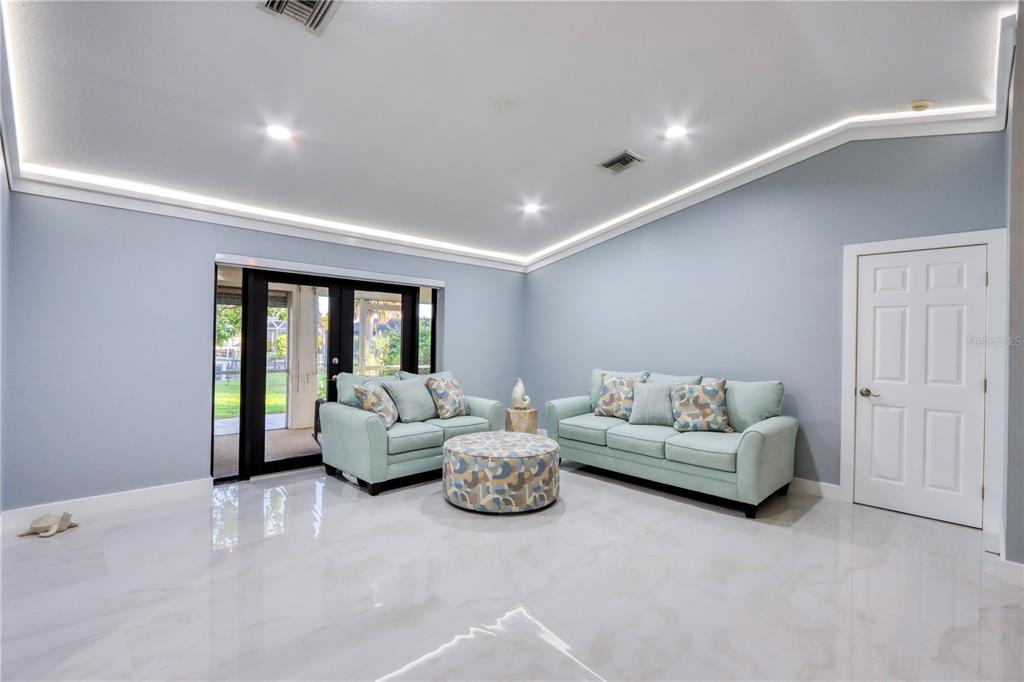 2500 Rio Lisbo Court Punta Gorda, FL 33950 - Photo 10 of 71 a living room with furniture and a window