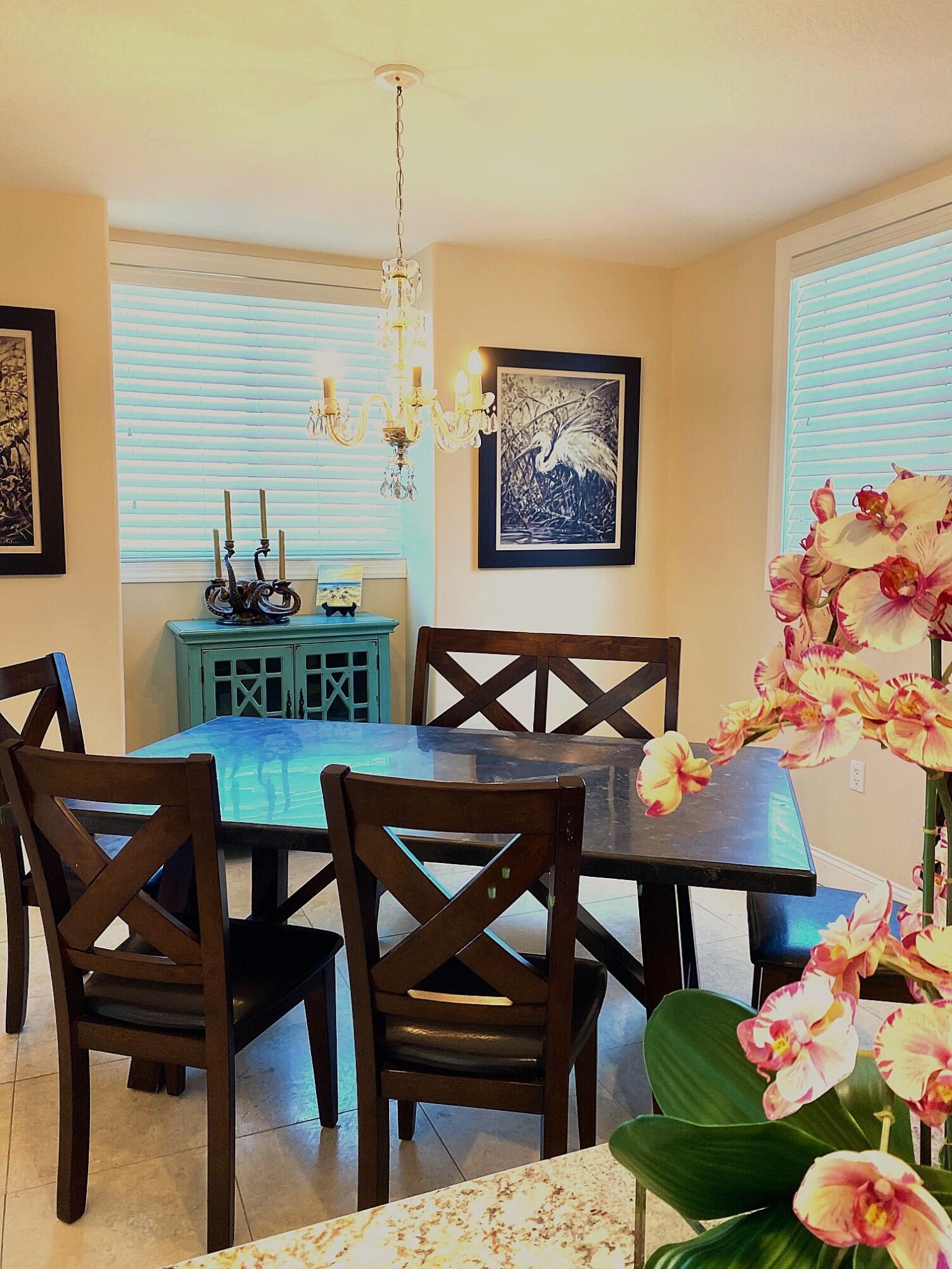 131 Coco Plum Road South Key Largo, FL 33037 - Photo 6 of 19 a view of a dining room with furniture