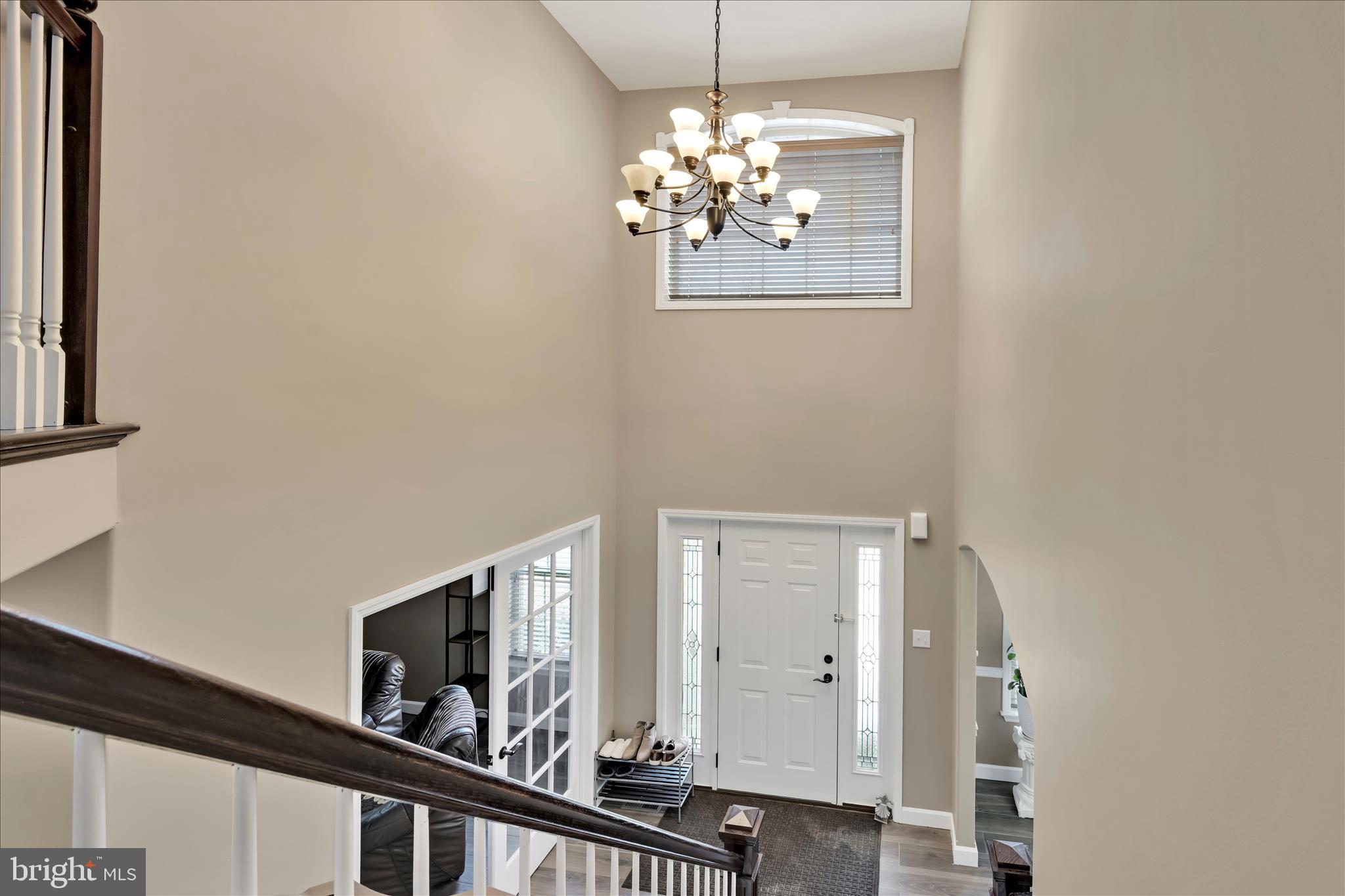 62 Stella Drive Reading, PA 19608 - Photo 5 of 41 a view of a hallway with a chandelier