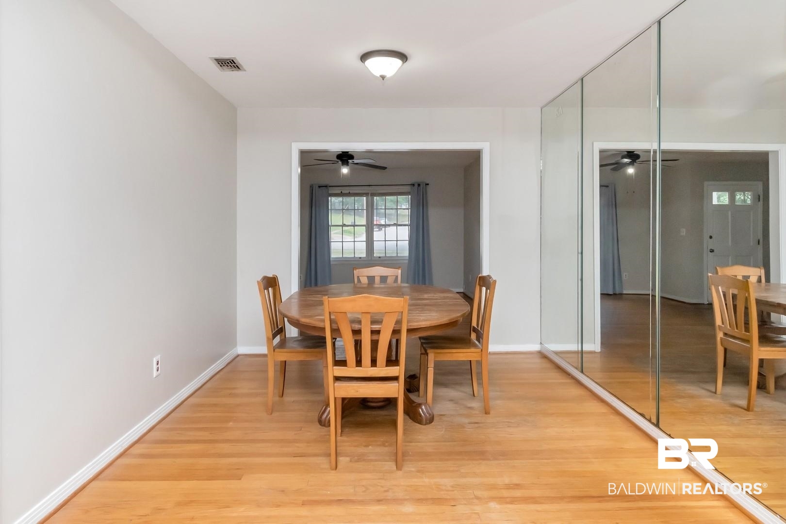 320 Vanderbilt Drive Mobile, AL 36608 - Photo 12 of 39 Dining area featuring light wood-type flooring and ceiling fan
