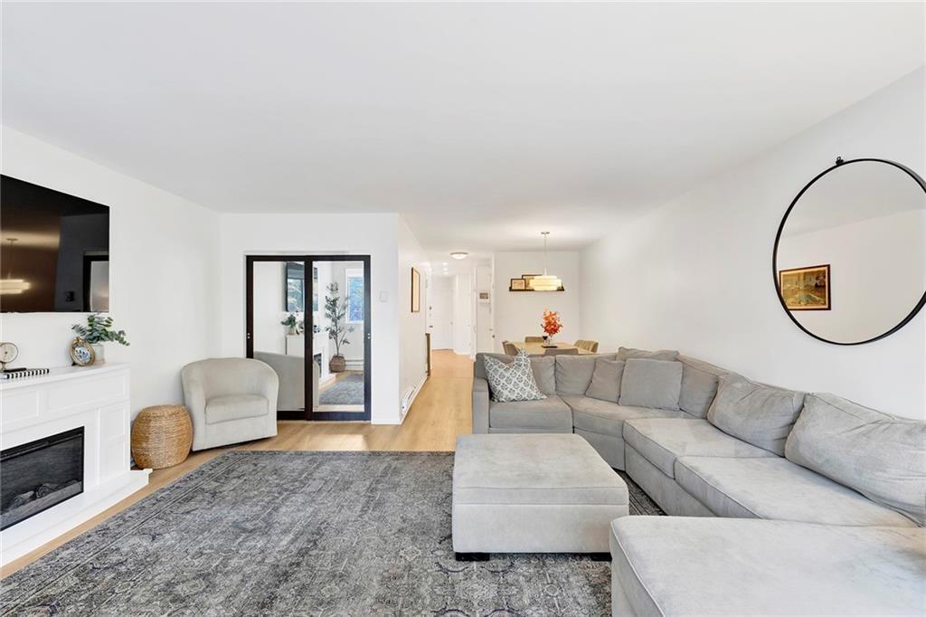 8940 Colonial Road, Unit 3 Brooklyn, NY 11209 - Photo 3 of 21 a living room with furniture and a flat screen tv