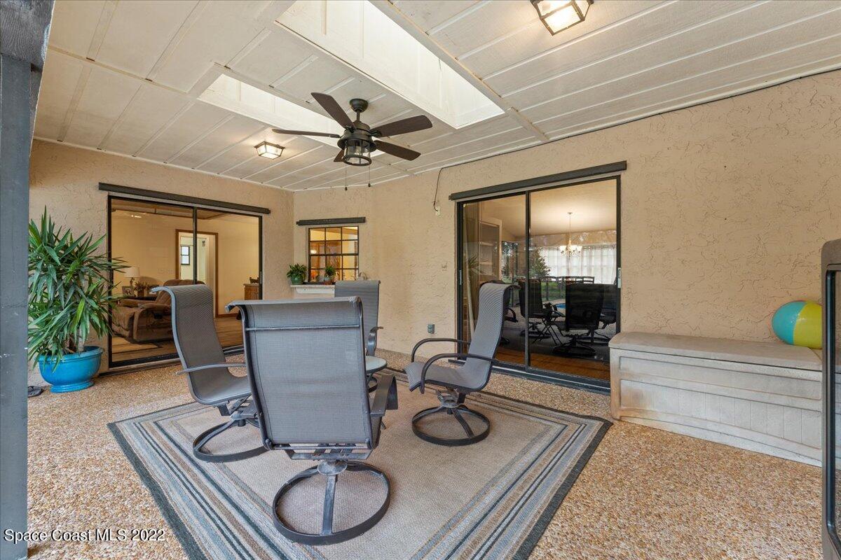 3205 Westland Melbourne, FL 32934 - Photo 16 of 55 a room with furniture and wooden floor