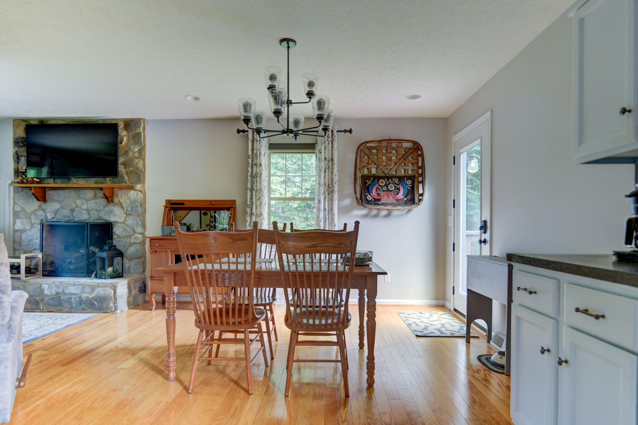 2018 Eagle Point Road Huddleston, VA 24104 - Photo 11 of 50 a view of a dining room with furniture window and wooden floor