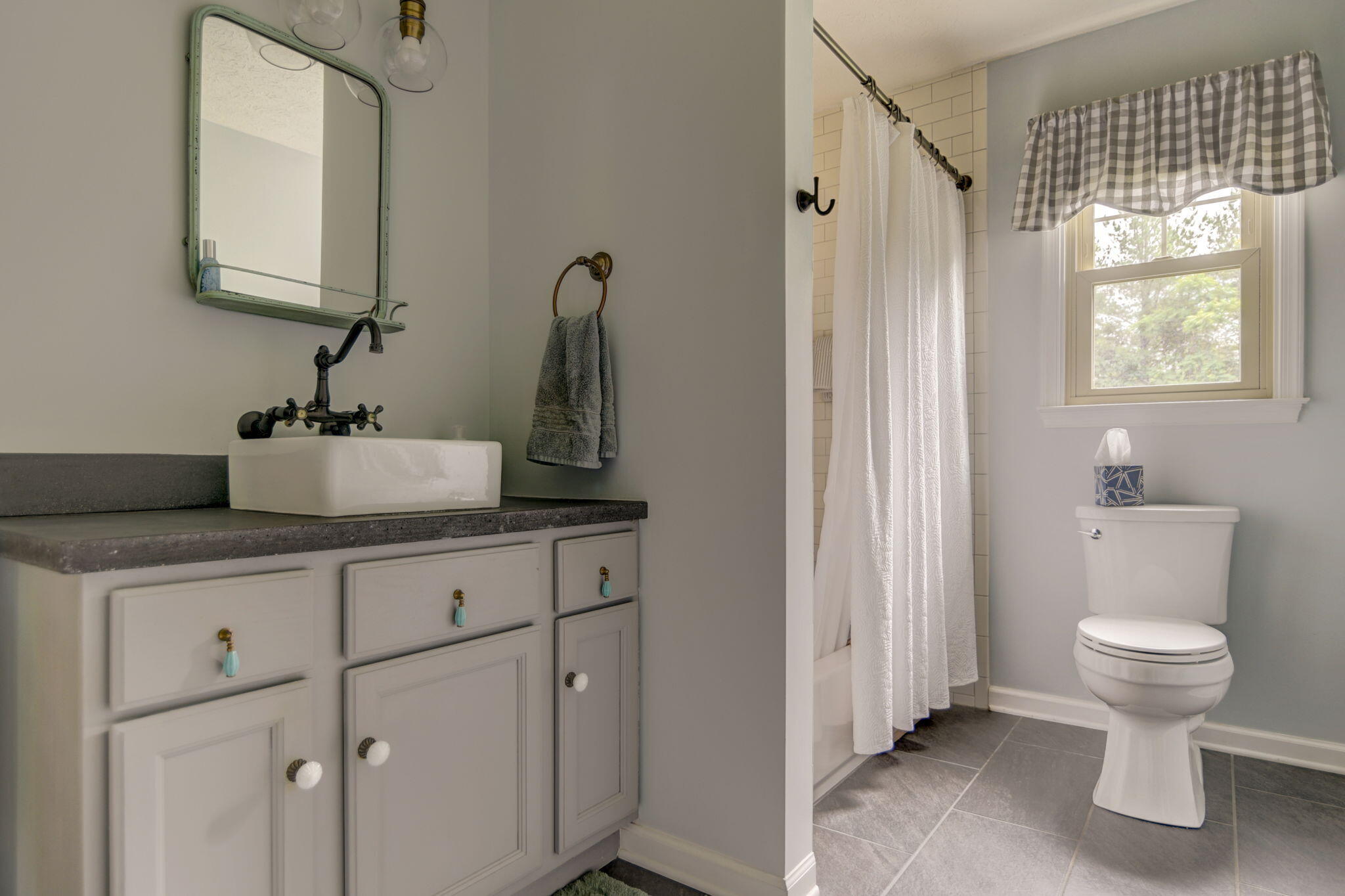 2018 Eagle Point Road Huddleston, VA 24104 - Photo 16 of 50 a bathroom with a toilet sink and mirror