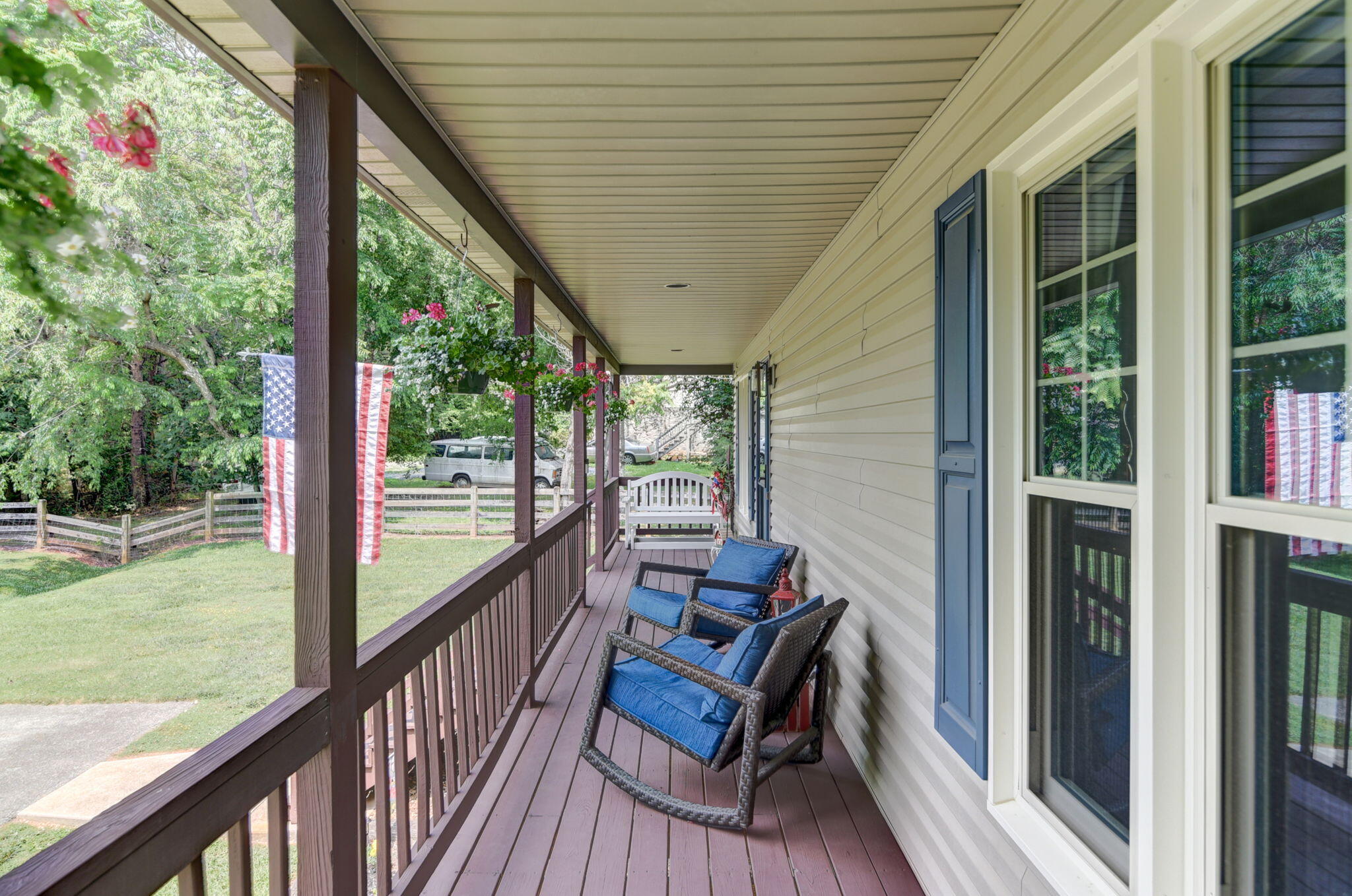 2018 Eagle Point Road Huddleston, VA 24104 - Photo 3 of 50 a view of a two chairs in the balcony next to a yard
