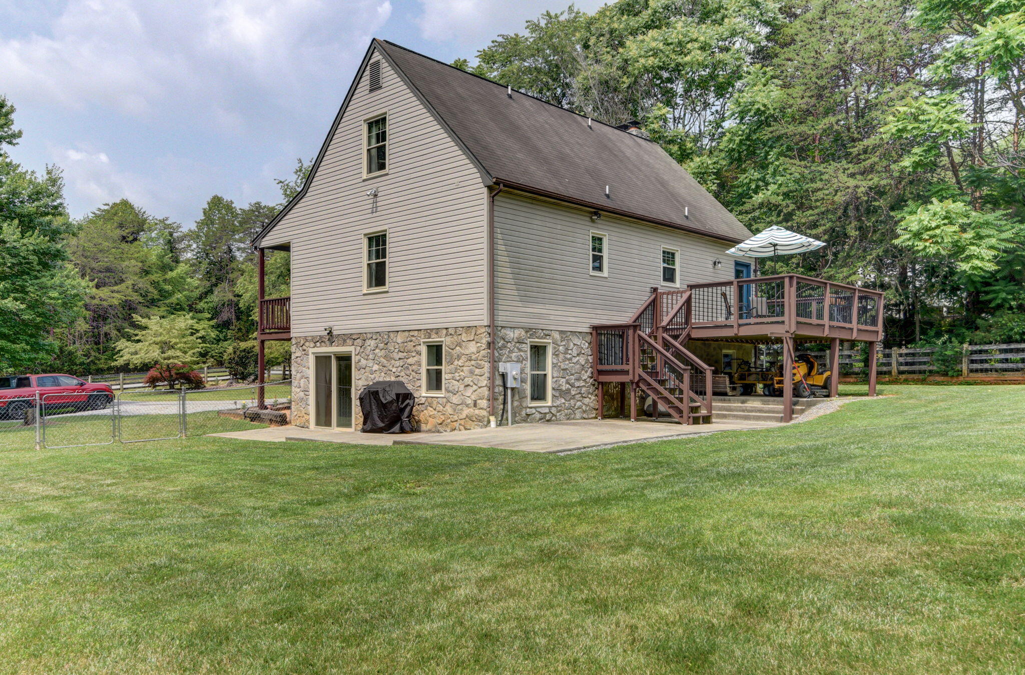 2018 Eagle Point Road Huddleston, VA 24104 - Photo 48 of 50 a view of a house with a yard and sitting area