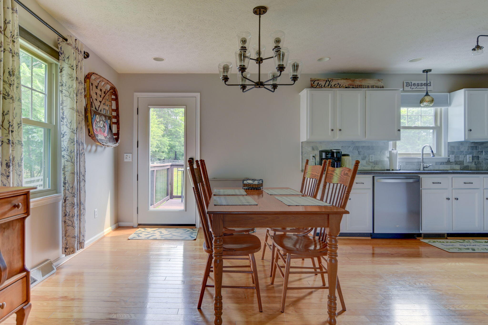 2018 Eagle Point Road Huddleston, VA 24104 - Photo 8 of 50 a view of a dining room with furniture window and wooden floor