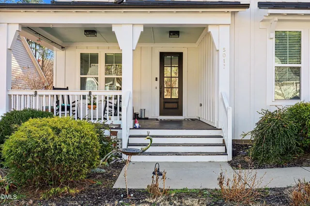 a kitchen with a sink stove and microwave