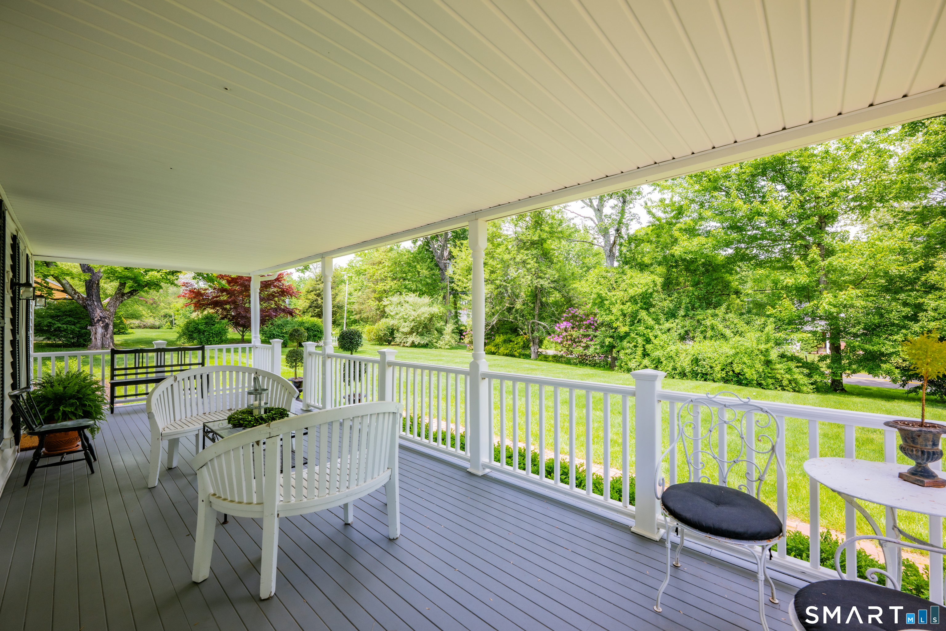 1000 Bassett Road Watertown, CT 06795 - Photo 34 of 35 a view of a chairs and table in patio with a yard