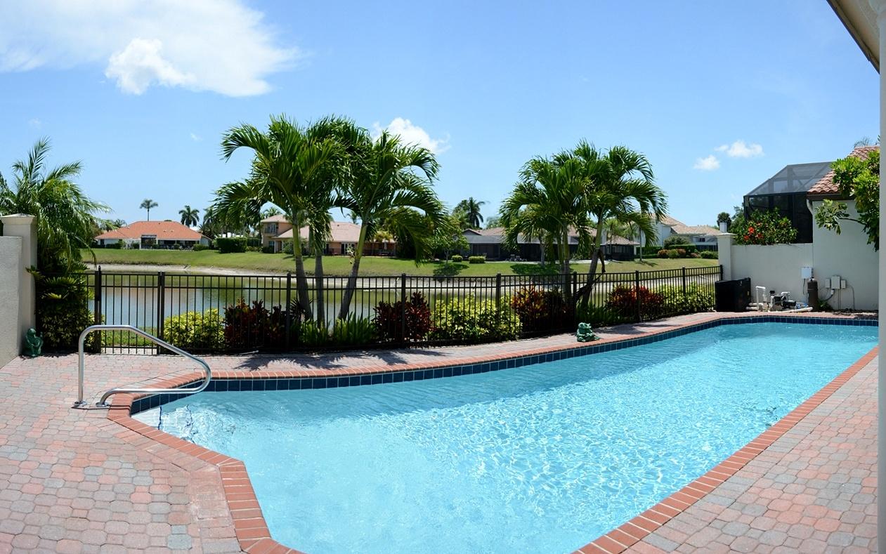 23376 Mirabella Circle South Boca Raton, FL 33433 - Photo 1 of 36 Pool Deck with Lake Views