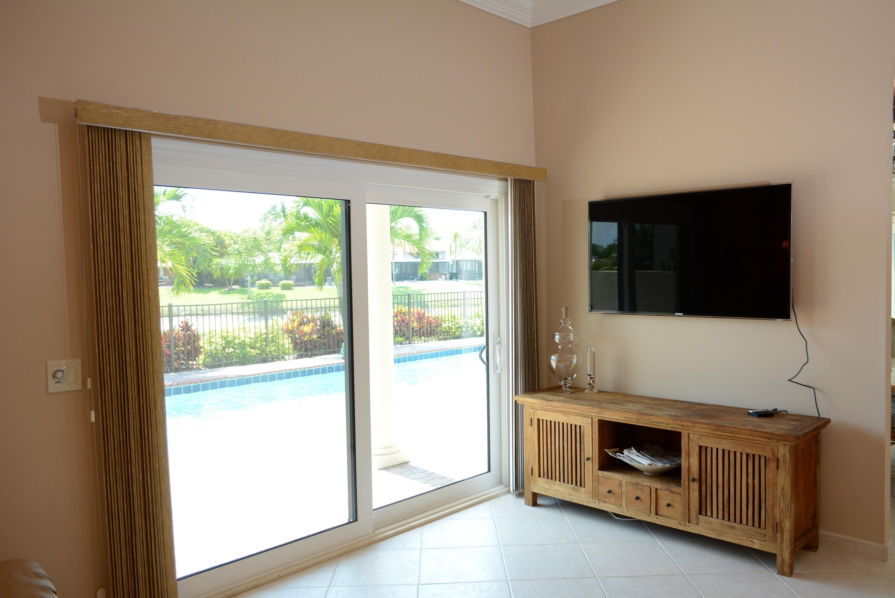 23376 Mirabella Circle South Boca Raton, FL 33433 - Photo 16 of 36 Family Room to Pool