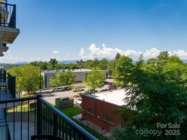 a view of a balcony with lake view