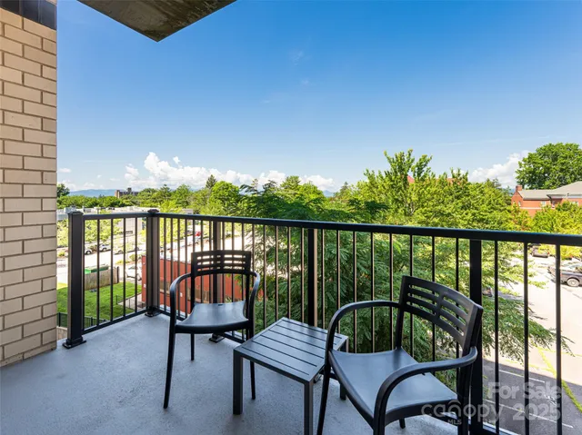 a view of a chairs in balcony