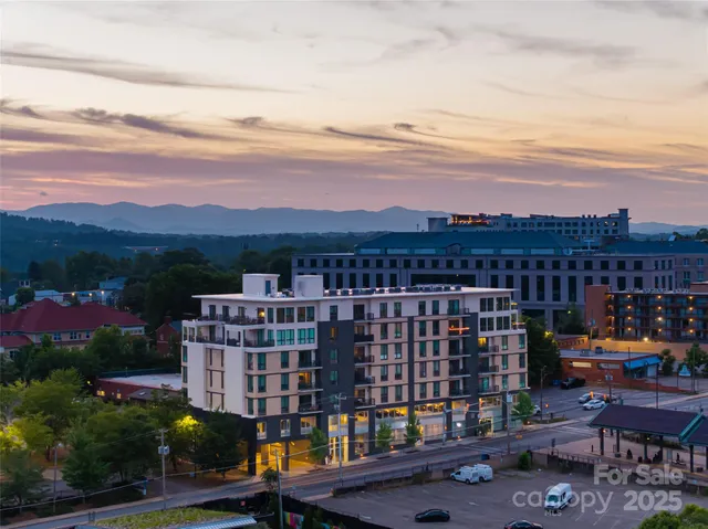 a view of a city with tall buildings