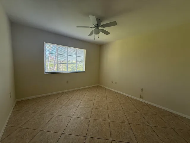 a view of a kitchen with a sink and a cabinets